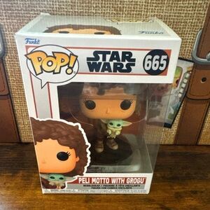 Funko Pop Star Wars: The Mandalorian Season 3 - Peli Motto with Grogu # 665